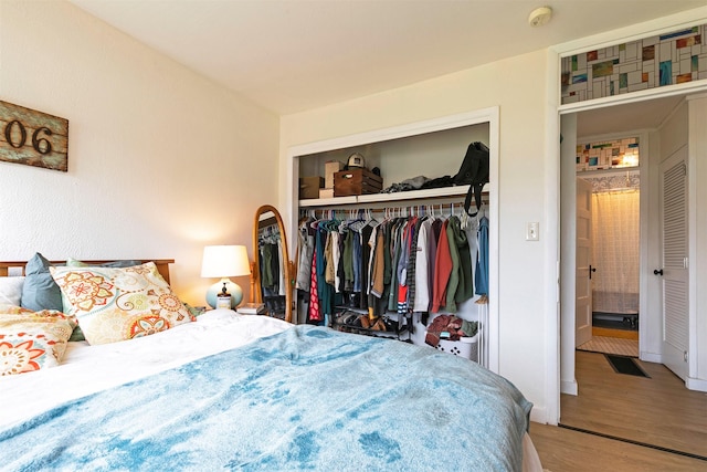 2112 W Central Ave, Missoula, MT 59801 - bedroom with a closet, wood finished floors, and baseboards
