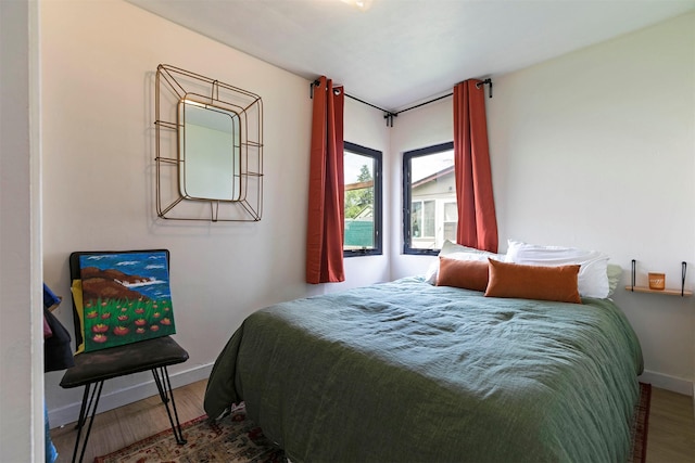2112 W Central Ave, Missoula, MT 59801 - bedroom featuring wood finished floors and baseboards