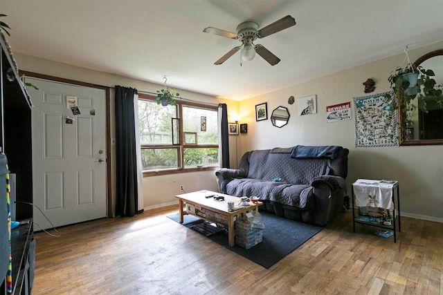 2112 W Central Ave, Missoula, MT 59801 - living area featuring a ceiling fan, wood finished floors, and baseboards