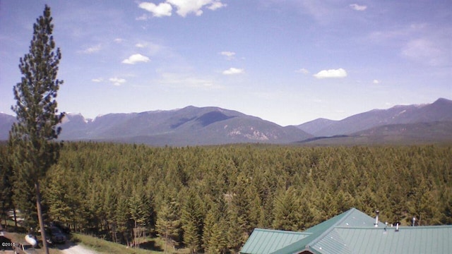 174 Badger Trl, Eureka, MT 59917 - mountain view featuring a forest