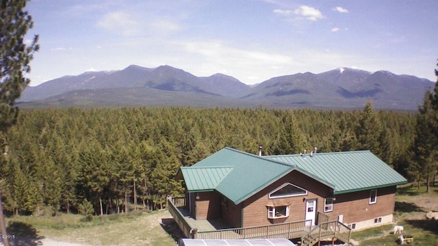 174 Badger Trl, Eureka, MT 59917 - view of mountain backdrop with a forest
