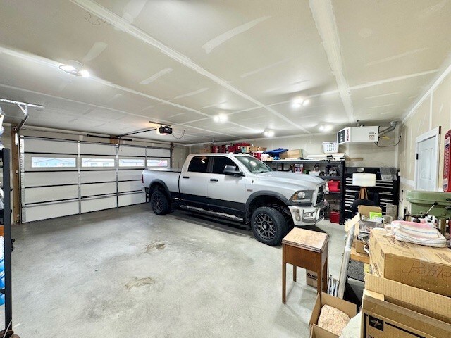 3975 Jaycee Ct Unit B, East Helena, MT 59635 - garage featuring a garage door opener