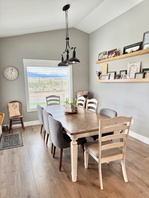 3975 Jaycee Ct Unit B, East Helena, MT 59635 - dining space with lofted ceiling, light wood-type flooring, and baseboards