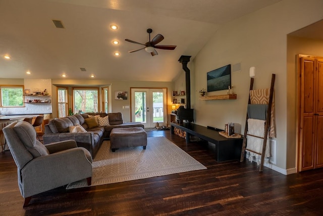 living area with a ceiling fan, wood finished floors, plenty of natural light, lofted ceiling, and recessed lighting
