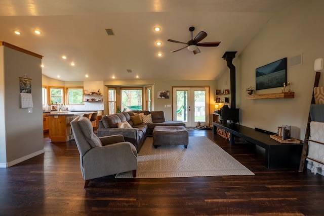 living room with ceiling fan, dark wood finished floors, vaulted ceiling, recessed lighting, and baseboards