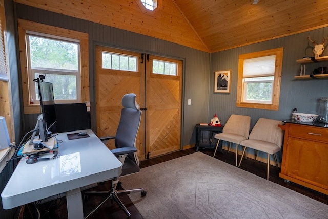 office featuring healthy amount of natural light, lofted ceiling, and wood finished floors