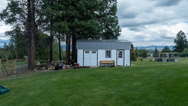 view of shed with a mountain view