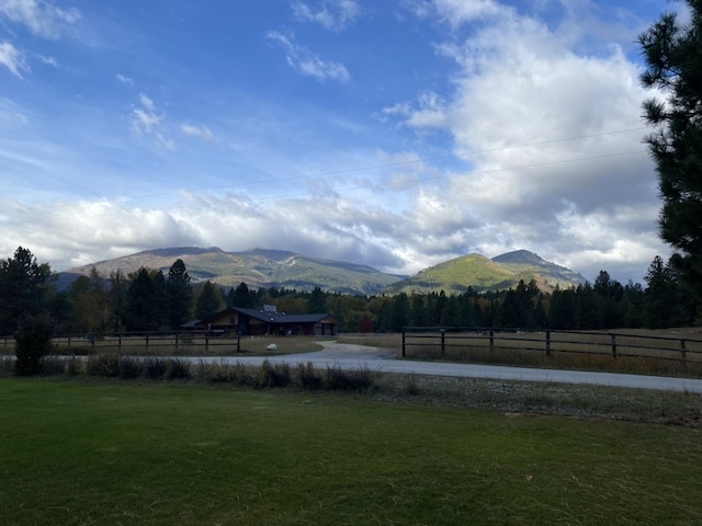 view of mountain backdrop featuring rural landscape