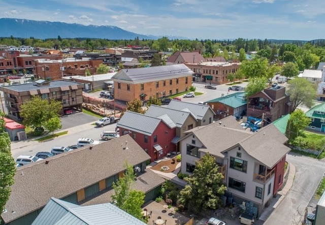 aerial perspective of suburban area featuring a mountain backdrop