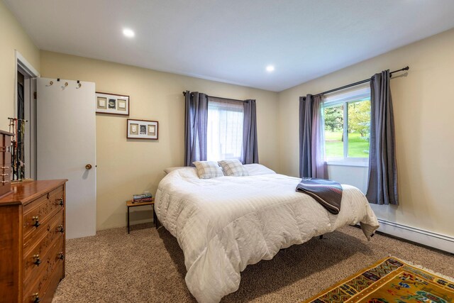 500 Geddis St, Helena, MT 59601 - carpeted bedroom featuring a baseboard radiator and recessed lighting