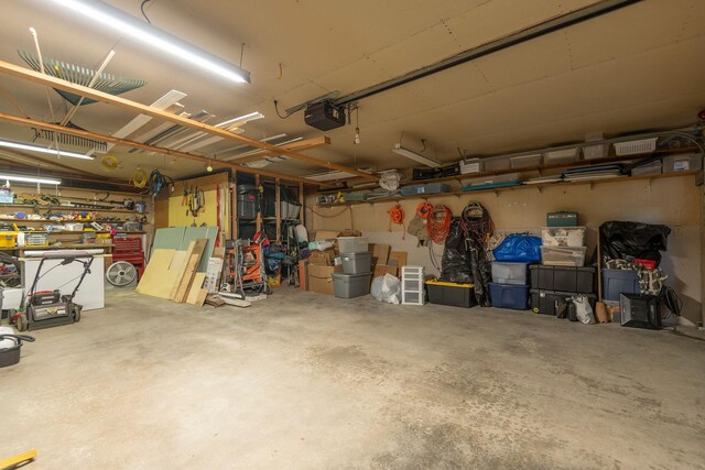 500 Geddis St, Helena, MT 59601 - garage with a garage door opener and a workshop area