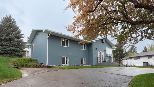 500 Geddis St, Helena, MT 59601 - rear view of property featuring cooling unit and concrete driveway