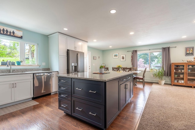 500 Geddis St, Helena, MT 59601 - kitchen featuring stainless steel appliances, a sink, white cabinets, recessed lighting, and dark wood-style floors