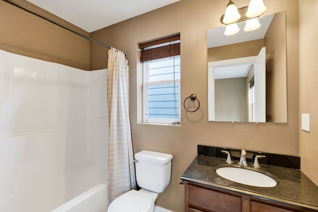 full bathroom featuring vanity, toilet, and shower / bathtub combination with curtain
