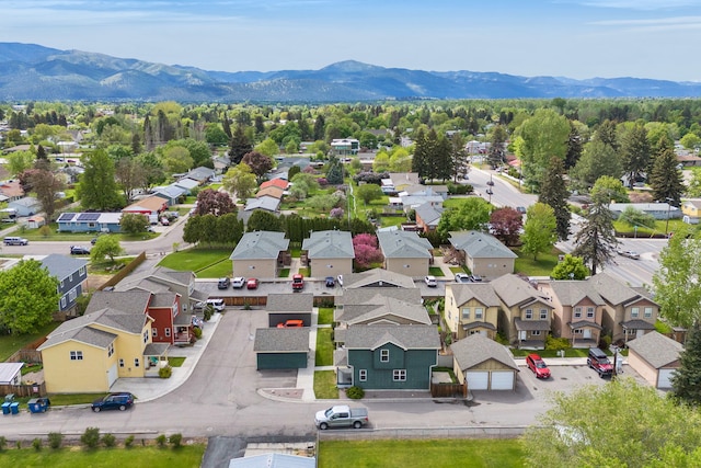 aerial view of residential area with a mountain backdrop