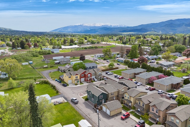 aerial view of residential area with mountains