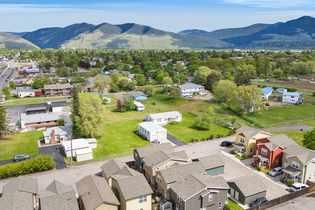 aerial view of residential area with mountains