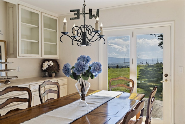 215 Browns Gulch Rd, Kalispell, MT 59901 - dining area with a chandelier and crown molding