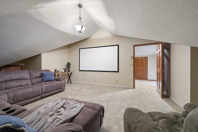 215 Browns Gulch Rd, Kalispell, MT 59901 - cinema room featuring light carpet, vaulted ceiling, a textured ceiling, and baseboards