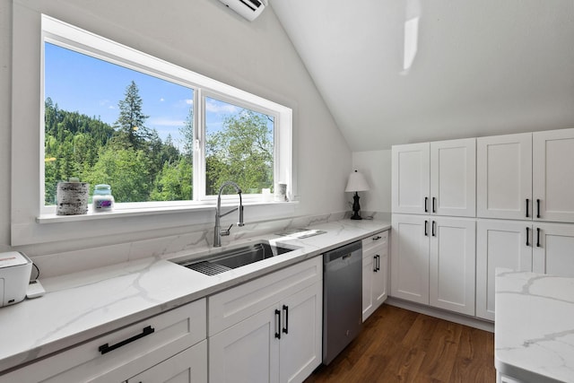 215 Browns Gulch Rd, Kalispell, MT 59901 - kitchen with dishwasher, a sink, vaulted ceiling, white cabinets, and dark wood-style floors
