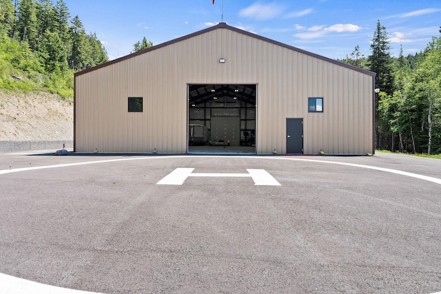 215 Browns Gulch Rd, Kalispell, MT 59901 - view of property featuring a detached garage and a pole building
