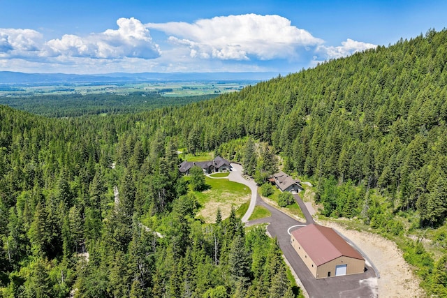 215 Browns Gulch Rd, Kalispell, MT 59901 - view of subject property with a forest