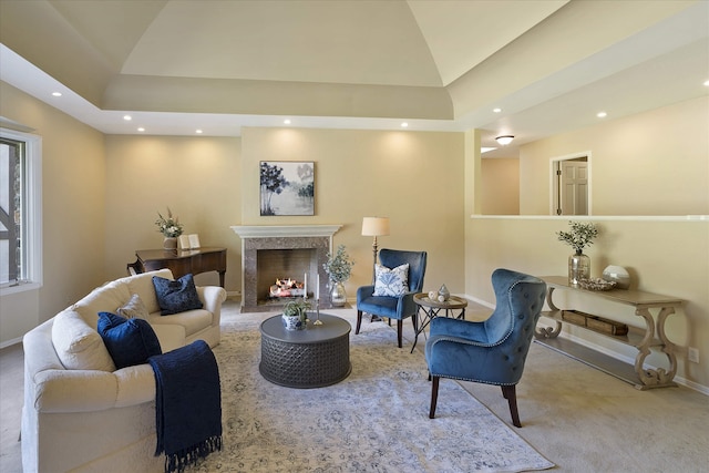 215 Browns Gulch Rd, Kalispell, MT 59901 - carpeted living room with recessed lighting, baseboards, lofted ceiling, and a premium fireplace