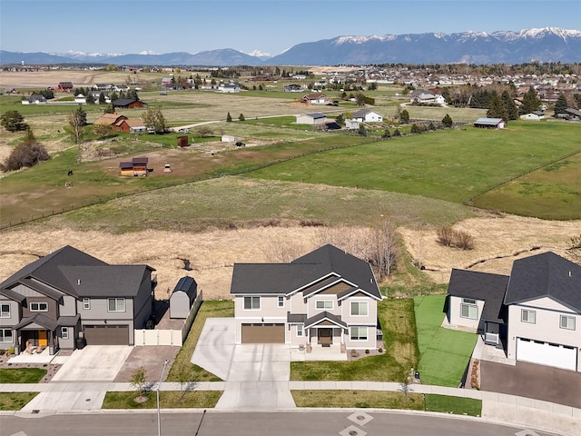 view of subject property with mountains
