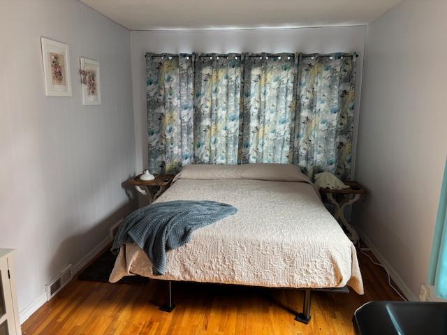 330 2nd St S, Shelby, MT 59474 - bedroom with wood finished floors and baseboards
