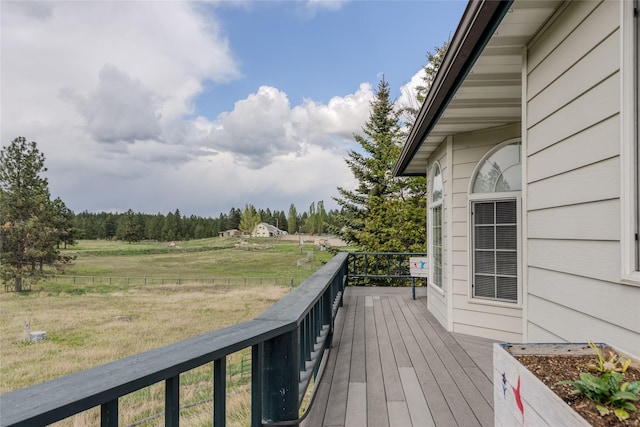 527 Grande Vista Dr, Kalispell, MT 59901 - wooden terrace featuring a lawn