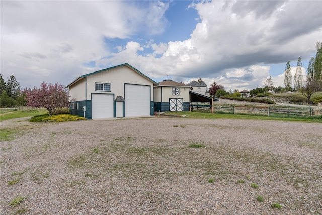 527 Grande Vista Dr, Kalispell, MT 59901 - view of outbuilding featuring fence and an outdoor structure