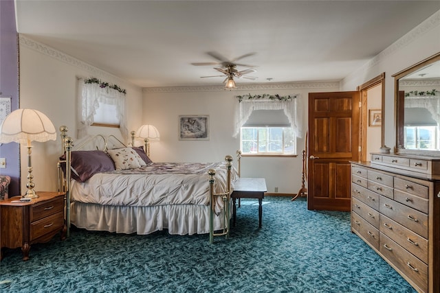 527 Grande Vista Dr, Kalispell, MT 59901 - bedroom with dark colored carpet and ceiling fan