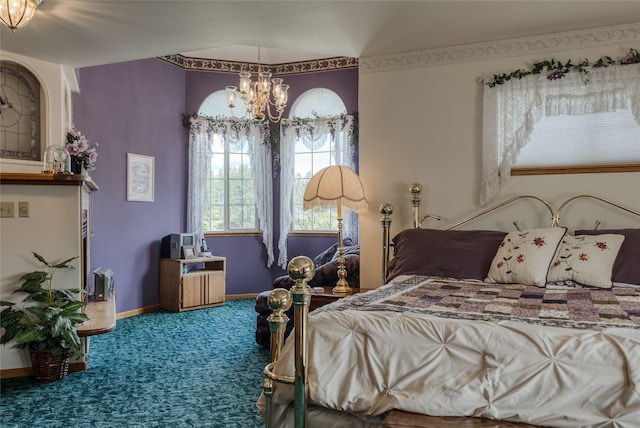 527 Grande Vista Dr, Kalispell, MT 59901 - bedroom with a chandelier, carpet floors, and baseboards