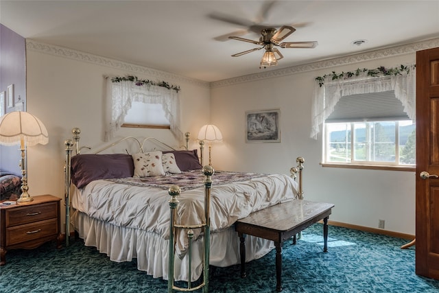 527 Grande Vista Dr, Kalispell, MT 59901 - bedroom featuring carpet floors, baseboards, and ceiling fan