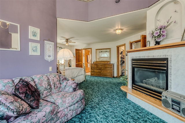 527 Grande Vista Dr, Kalispell, MT 59901 - carpeted living area with a fireplace and a ceiling fan