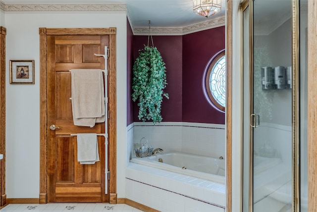 527 Grande Vista Dr, Kalispell, MT 59901 - bathroom with a bath, baseboards, and ornamental molding