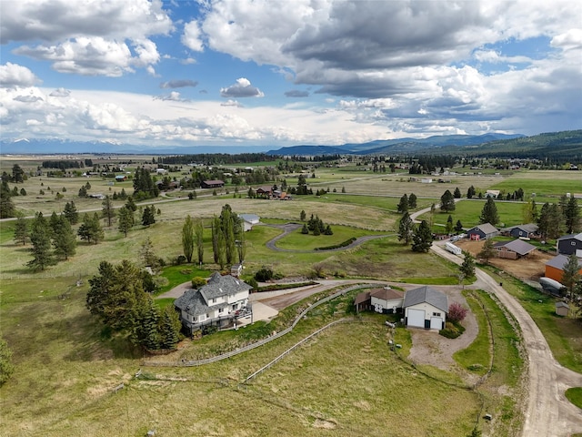 527 Grande Vista Dr, Kalispell, MT 59901 - aerial view of sparsely populated area with a mountainous background