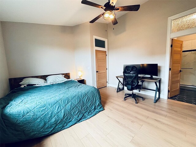 687 Road Runner St Unit B, Helena, MT 59602 - bedroom featuring wood finished floors, a desk, vaulted ceiling, a ceiling fan, and baseboards