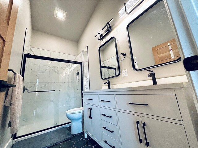 687 Road Runner St Unit B, Helena, MT 59602 - full bathroom featuring a marble finish shower, toilet, tile patterned flooring, and double vanity