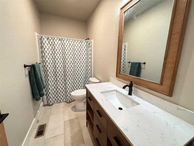 687 Road Runner St Unit B, Helena, MT 59602 - full bathroom featuring toilet, tile patterned floors, vanity, and a shower with curtain