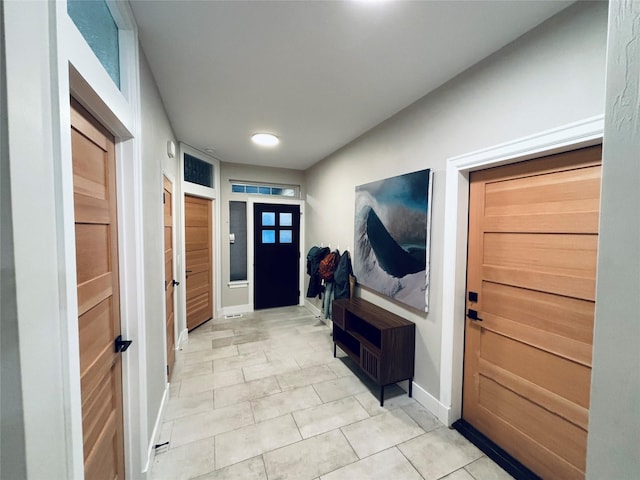 687 Road Runner St Unit B, Helena, MT 59602 - foyer featuring light tile patterned floors and baseboards