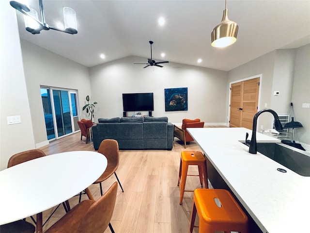 687 Road Runner St Unit B, Helena, MT 59602 - living area with light wood finished floors, vaulted ceiling, a ceiling fan, and recessed lighting