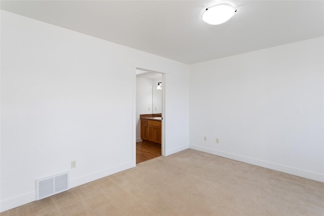 2060 Marina Ct, Bigfork, MT 59911 - spare room with light carpet and baseboards
