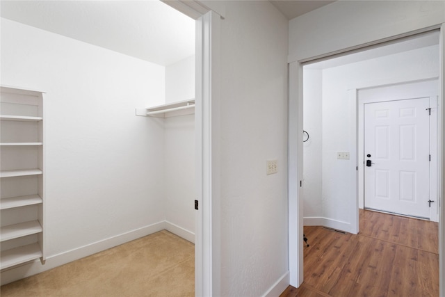 2060 Marina Ct, Bigfork, MT 59911 - walk in closet featuring wood finished floors