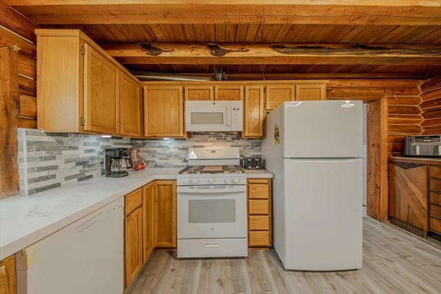 6470 US Highway 93 S, Eureka, MT 59917 - kitchen with white appliances, a wood ceiling with exposed beams, light wood finished floors, backsplash, and brown cabinets