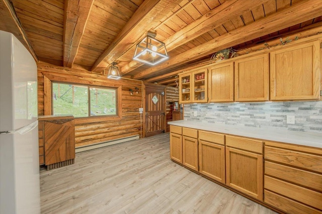 6470 US Highway 93 S, Eureka, MT 59917 - kitchen with freestanding refrigerator, a baseboard radiator, a wooden ceiling with exposed beams, log walls, and light countertops