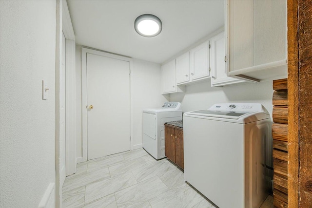 6470 US Highway 93 S, Eureka, MT 59917 - laundry area featuring washing machine and dryer and cabinet space