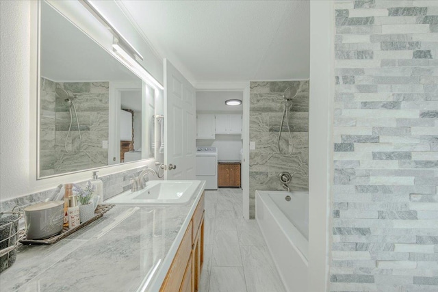 6470 US Highway 93 S, Eureka, MT 59917 - full bath featuring washer / clothes dryer, marble look tiles, vanity, and shower / tub combination