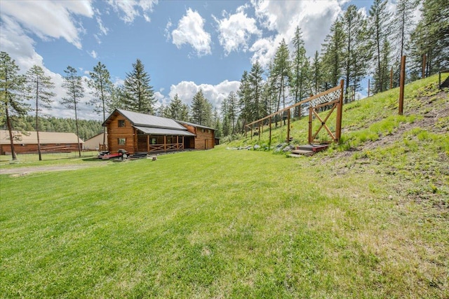 6470 US Highway 93 S, Eureka, MT 59917 - view of grassy yard with a barn and an outbuilding