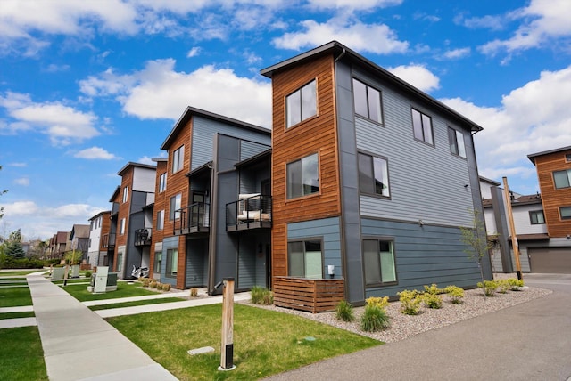view of building exterior with a residential view